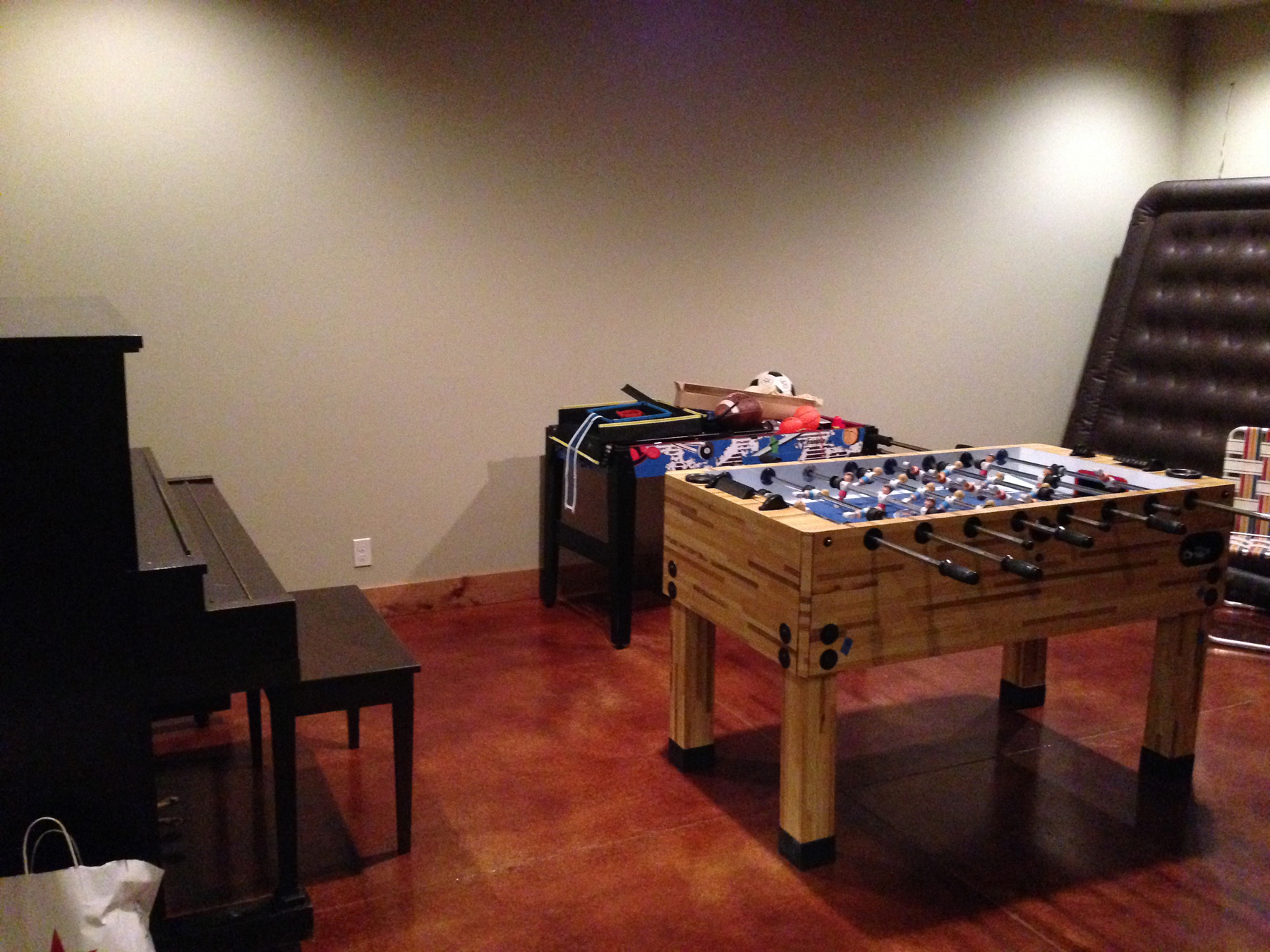 Entertainment room with foosball table.