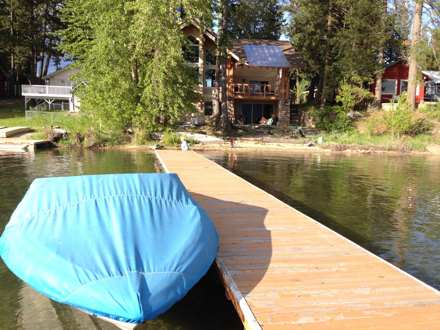 Wooden dock extending over water.