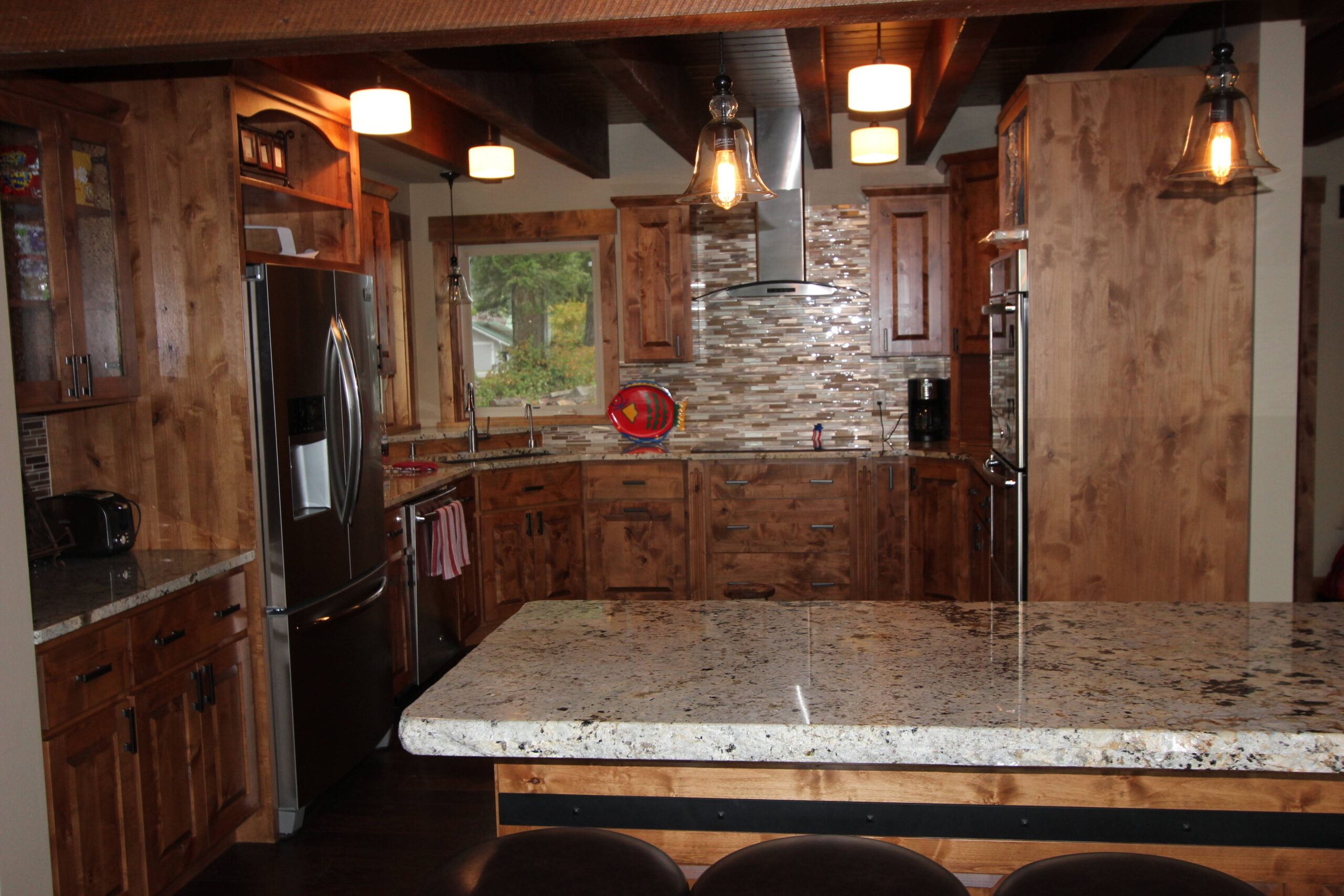 Kitchen close-up with appliances and granite.
